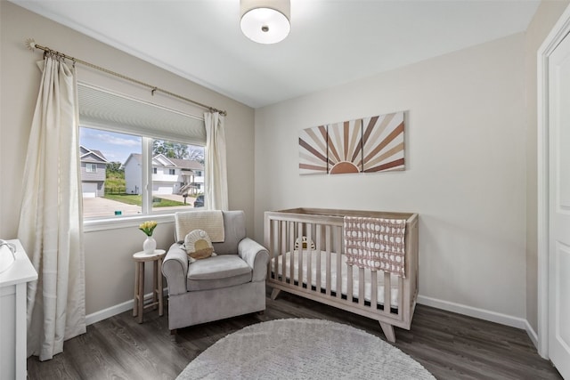 904 Hughes St, Coralville, IA 52241 - bedroom with wood finished floors and a crib