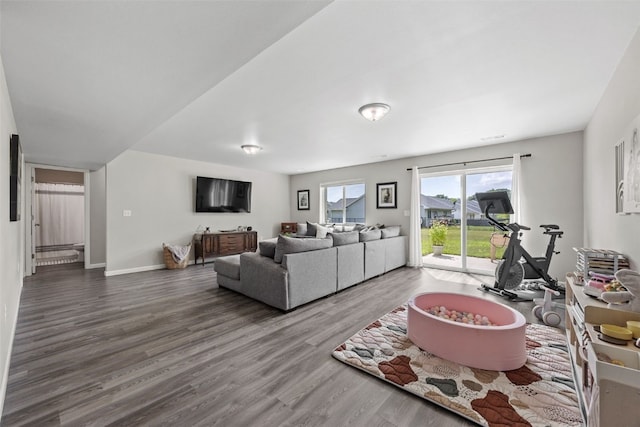904 Hughes St, Coralville, IA 52241 - living area featuring wood finished floors and baseboards