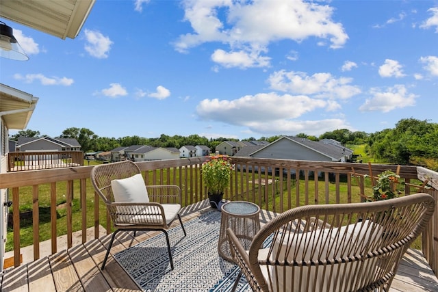 904 Hughes St, Coralville, IA 52241 - wooden deck featuring a yard and a residential view