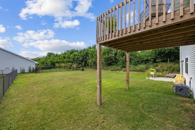 904 Hughes St, Coralville, IA 52241 - view of yard featuring a patio area and a wooden deck