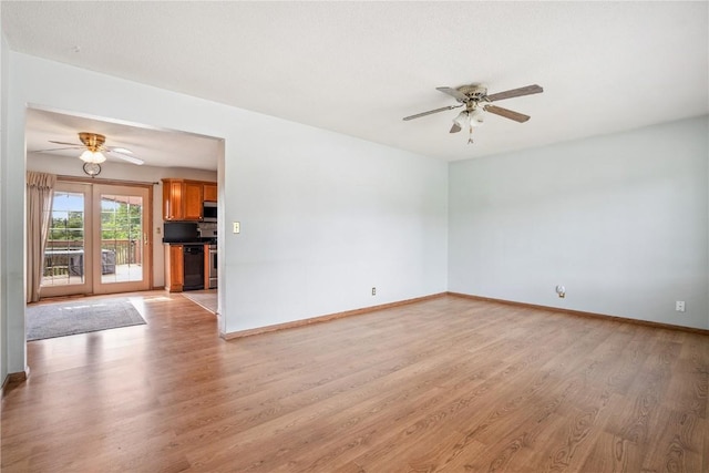 918 29th St NW, Cedar Rapids, IA 52405 - empty room with ceiling fan and light wood-style floors