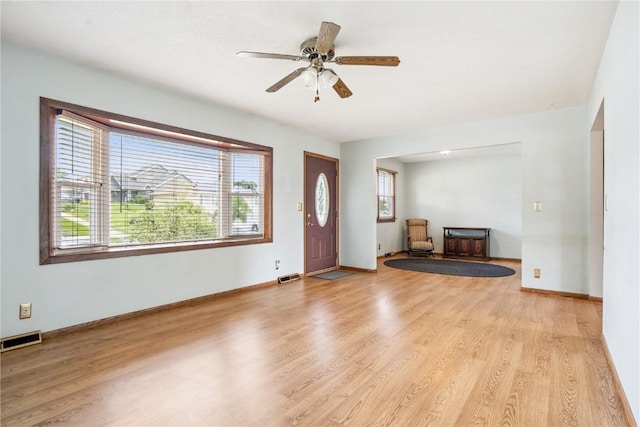 918 29th St NW, Cedar Rapids, IA 52405 - entryway featuring light wood-style floors and ceiling fan