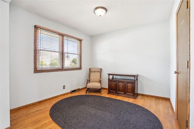 918 29th St NW, Cedar Rapids, IA 52405 - sitting room with light wood finished floors and baseboards