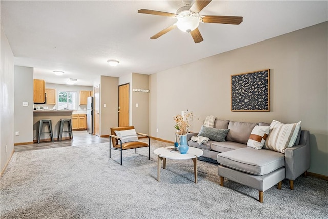 780 Magnolia Ln Unit 4, Marion, IA 52302 - living room with light colored carpet and ceiling fan