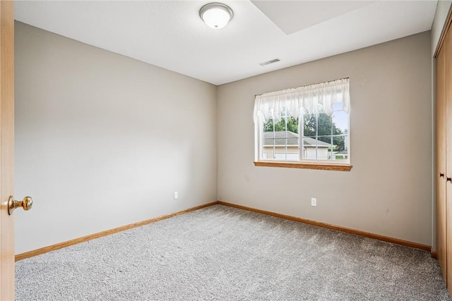 780 Magnolia Ln Unit 4, Marion, IA 52302 - empty room featuring carpet floors and baseboards