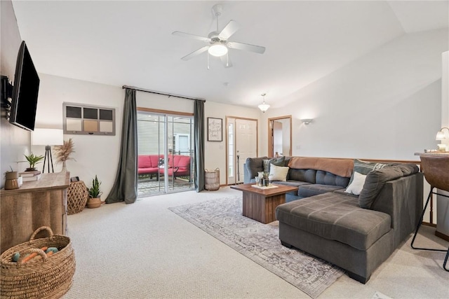 2176 49th St, Marion, IA 52302 - living room featuring vaulted ceiling, light carpet, and a ceiling fan