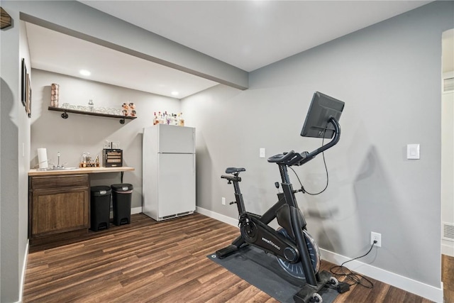 2176 49th St, Marion, IA 52302 - workout room with bar area, dark wood-type flooring, and recessed lighting