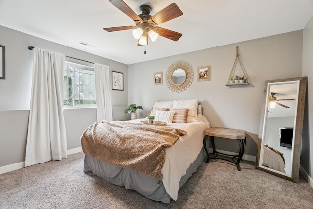 2176 49th St, Marion, IA 52302 - carpeted bedroom featuring baseboards and ceiling fan
