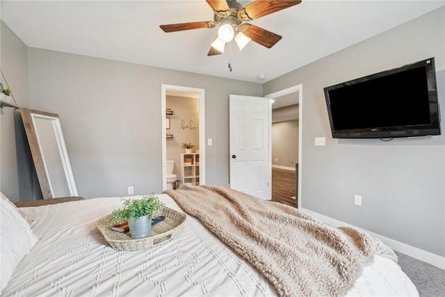 2176 49th St, Marion, IA 52302 - carpeted bedroom featuring ceiling fan and ensuite bath