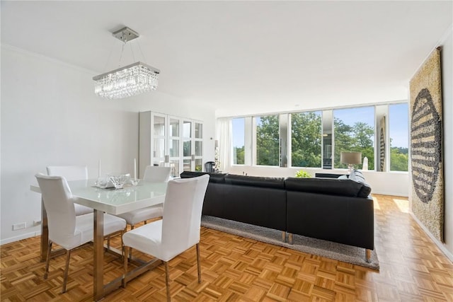 2222 1st Ave, Cedar Rapids, IA 52402 - dining space featuring healthy amount of natural light and a chandelier
