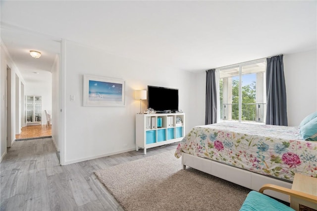2222 1st Ave, Cedar Rapids, IA 52402 - bedroom featuring wood finished floors and baseboards