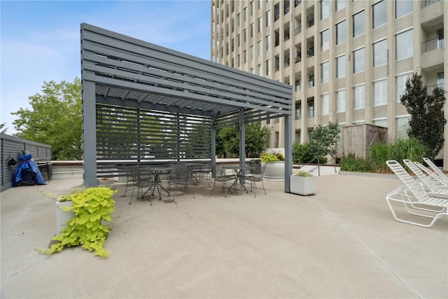 2222 1st Ave, Cedar Rapids, IA 52402 - view of patio / terrace with outdoor dining area and a pergola