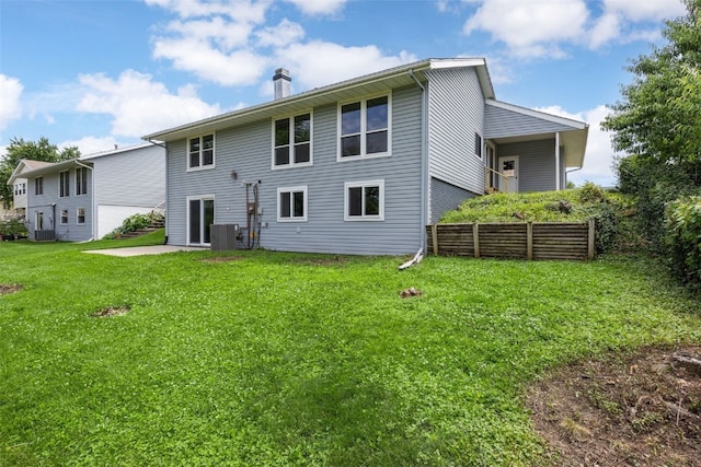 4812 Montclair Dr NW, Cedar Rapids, IA 52405 - rear view of property with a patio area and a chimney