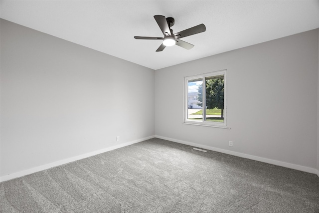 4812 Montclair Dr NW, Cedar Rapids, IA 52405 - empty room featuring a ceiling fan and carpet flooring