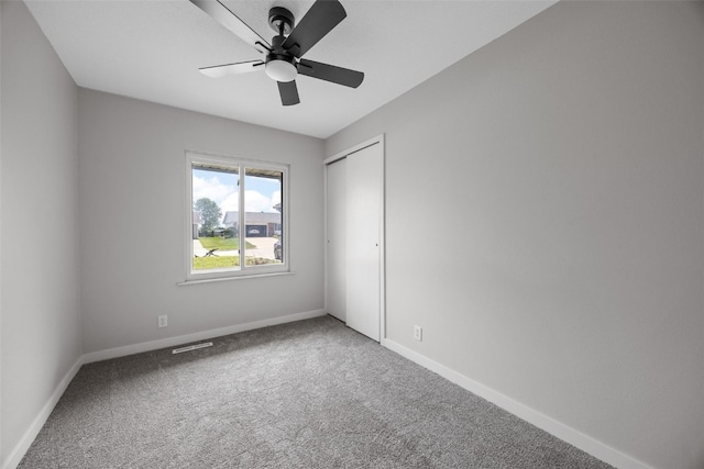 4812 Montclair Dr NW, Cedar Rapids, IA 52405 - unfurnished room with carpet floors and ceiling fan