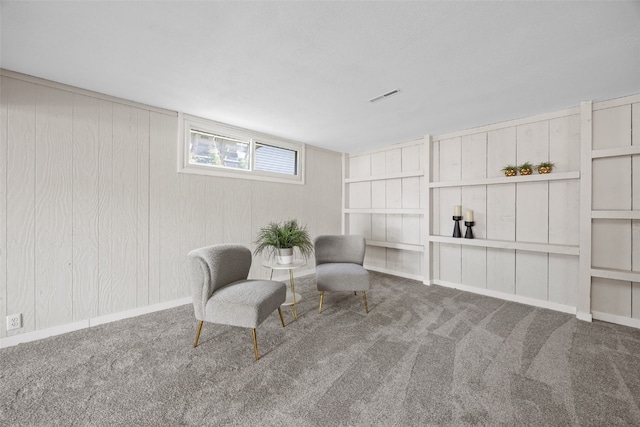 4812 Montclair Dr NW, Cedar Rapids, IA 52405 - living area featuring carpet flooring and built in features