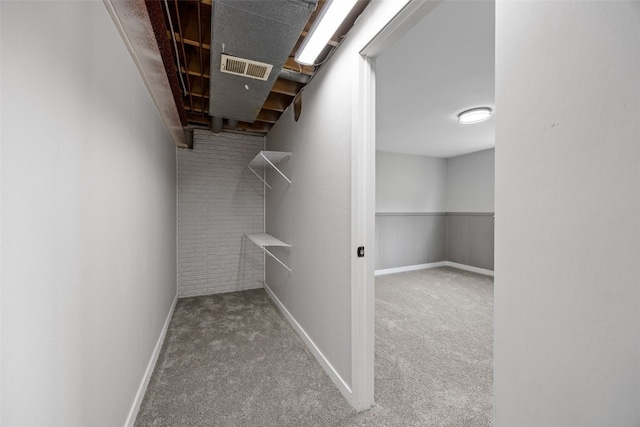 4812 Montclair Dr NW, Cedar Rapids, IA 52405 - walk in closet featuring carpet