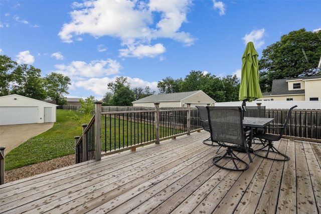 2816 Fruitland Blvd SW, Cedar Rapids, IA 52404 - wooden terrace with an outbuilding, a garage, and outdoor dining area