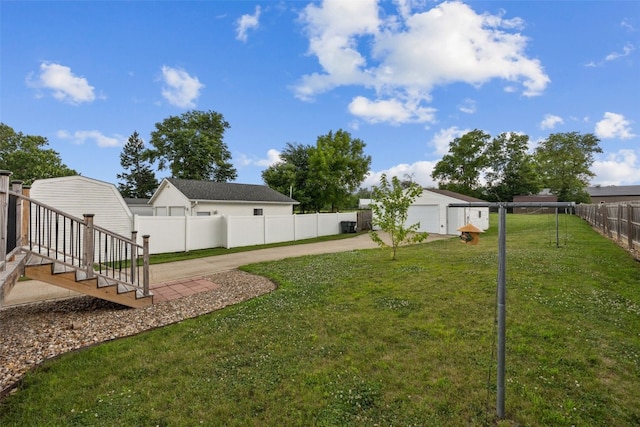 2816 Fruitland Blvd SW, Cedar Rapids, IA 52404 - fenced yard featuring driveway and a garage