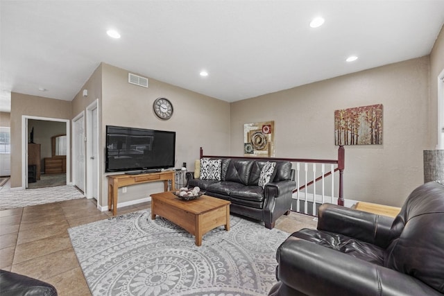 2816 Fruitland Blvd SW, Cedar Rapids, IA 52404 - living room featuring recessed lighting, tile patterned flooring, and stairway