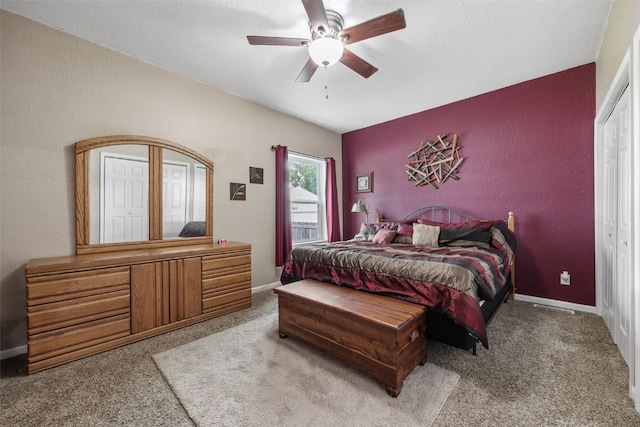 2816 Fruitland Blvd SW, Cedar Rapids, IA 52404 - carpeted bedroom with a ceiling fan and a textured wall