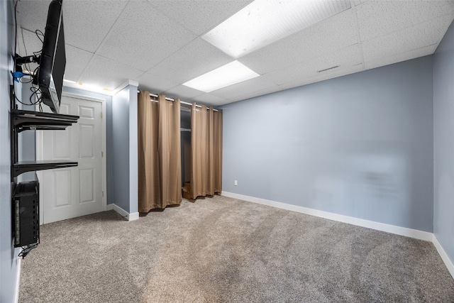 1125 Saint Andrews Dr, North Liberty, IA 52317 - unfurnished bedroom featuring carpet floors and a drop ceiling