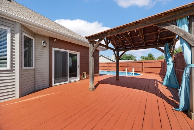1125 Saint Andrews Dr, North Liberty, IA 52317 - wooden terrace featuring a fenced backyard and a gazebo