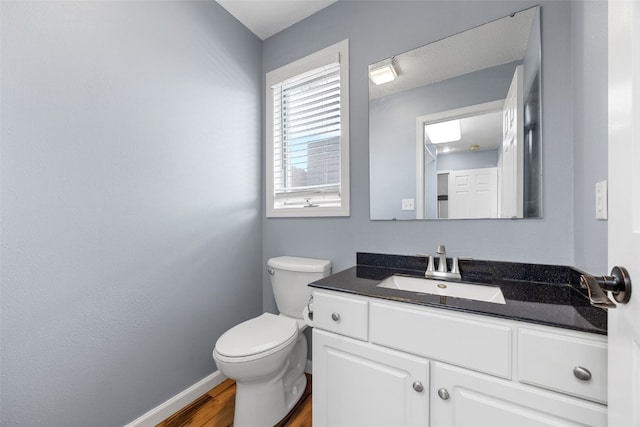 1125 Saint Andrews Dr, North Liberty, IA 52317 - bathroom featuring vanity and wood finished floors