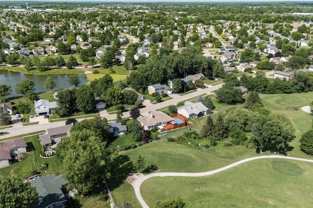 1125 Saint Andrews Dr, North Liberty, IA 52317 - aerial view of property and surrounding area with a local golf course, nearby suburban area, and a nearby body of water