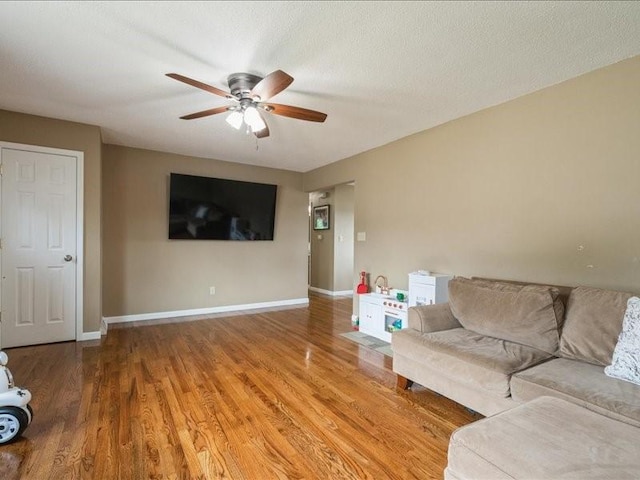 1175 F Ave, Marion, IA 52302 - living room with a ceiling fan and light wood-style flooring