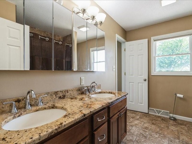1175 F Ave, Marion, IA 52302 - full bathroom with double vanity and a tile shower