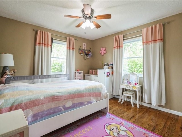 1175 F Ave, Marion, IA 52302 - bedroom featuring wood finished floors and ceiling fan