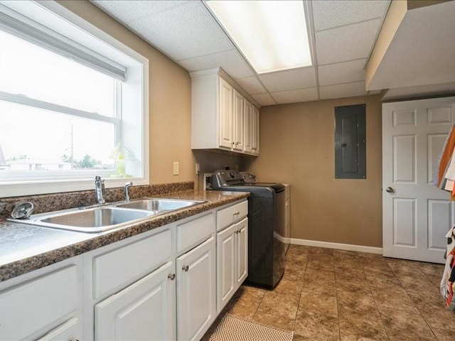 1175 F Ave, Marion, IA 52302 - laundry area featuring electric panel, cabinet space, and washer and dryer