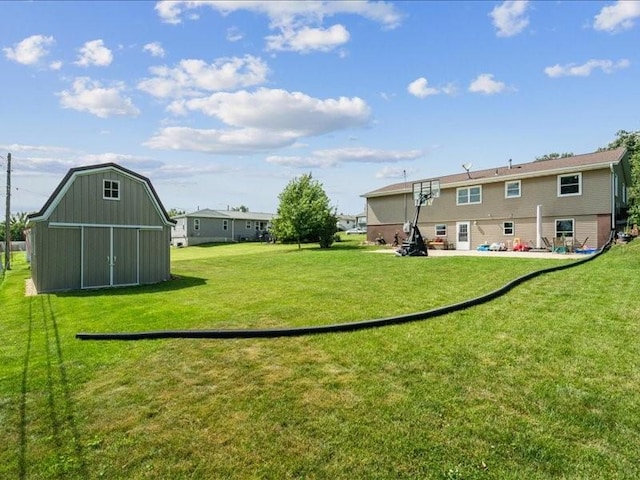 1175 F Ave, Marion, IA 52302 - view of green lawn with an outdoor structure and a patio