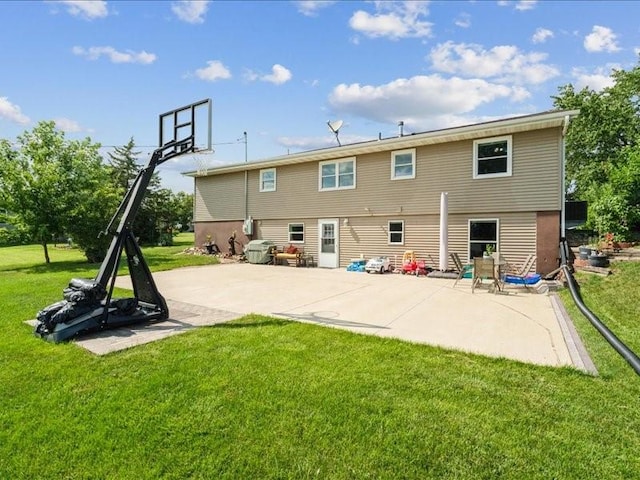 1175 F Ave, Marion, IA 52302 - back of property featuring a lawn and a patio area