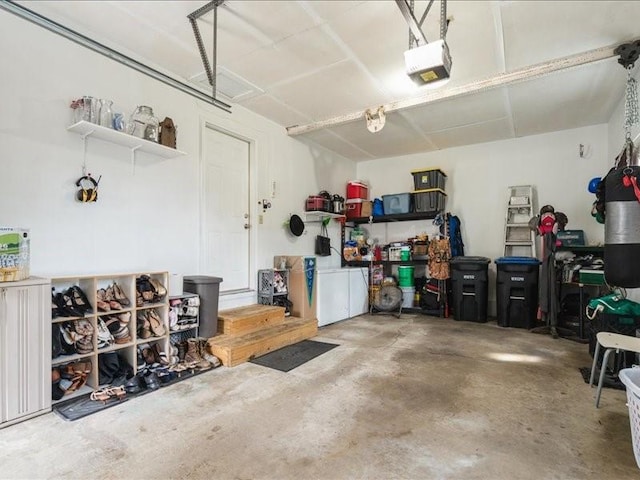 1175 F Ave, Marion, IA 52302 - garage featuring a garage door opener