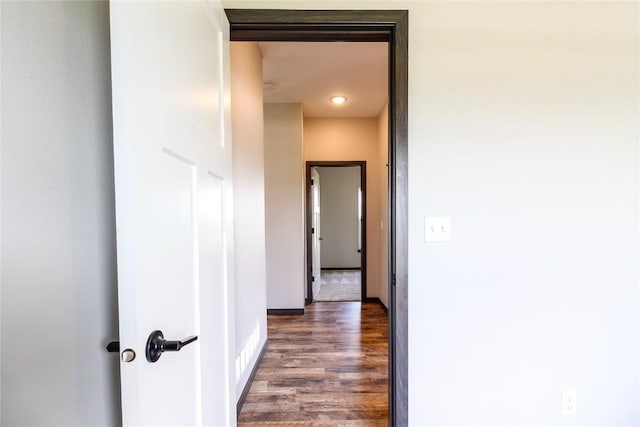 1600 Heartland St, Fairfax, IA 52228 - hallway featuring wood finished floors and baseboards