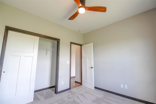 1600 Heartland St, Fairfax, IA 52228 - unfurnished bedroom featuring light colored carpet, a closet, and a ceiling fan