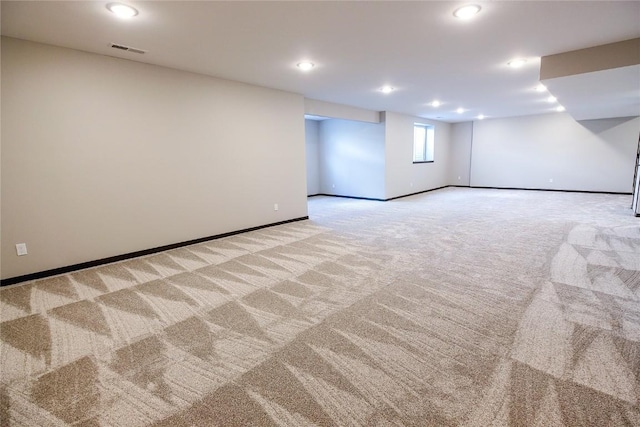 1600 Heartland St, Fairfax, IA 52228 - unfurnished room featuring light carpet and recessed lighting