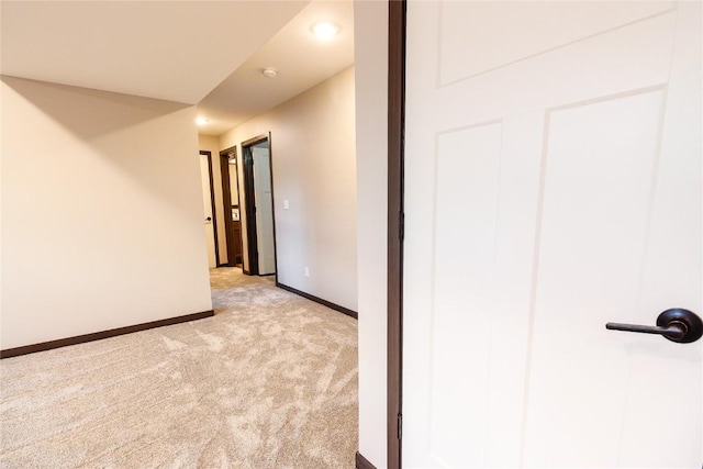 1600 Heartland St, Fairfax, IA 52228 - hallway featuring light carpet and recessed lighting