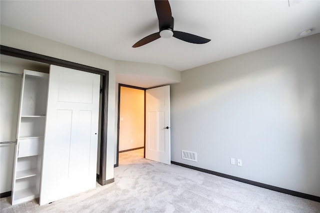 1600 Heartland St, Fairfax, IA 52228 - unfurnished bedroom featuring a closet, light colored carpet, and ceiling fan