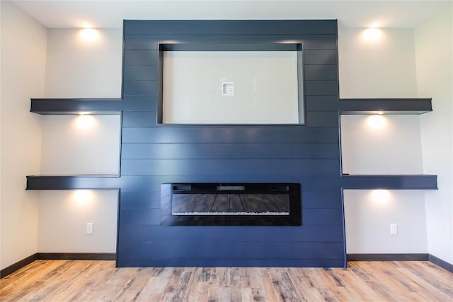 1600 Heartland St, Fairfax, IA 52228 - detailed view of a fireplace and wood finished floors