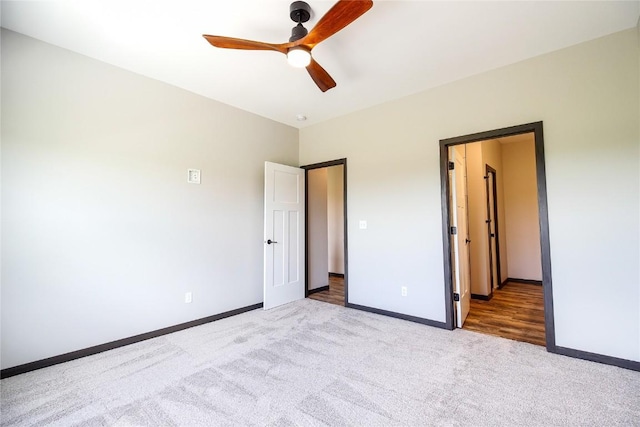 1600 Heartland St, Fairfax, IA 52228 - unfurnished bedroom featuring carpet floors and a ceiling fan