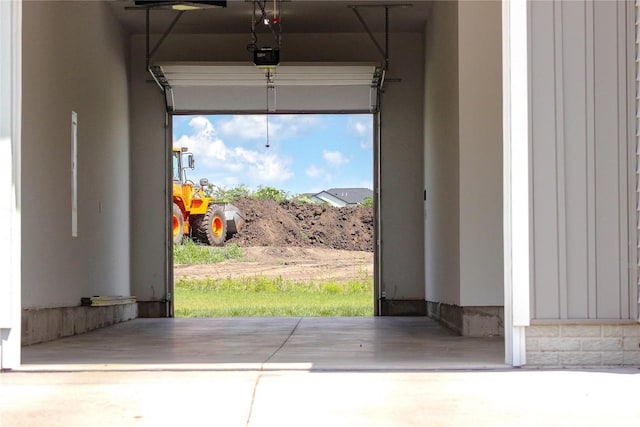 1600 Heartland St, Fairfax, IA 52228 - garage featuring a garage door opener