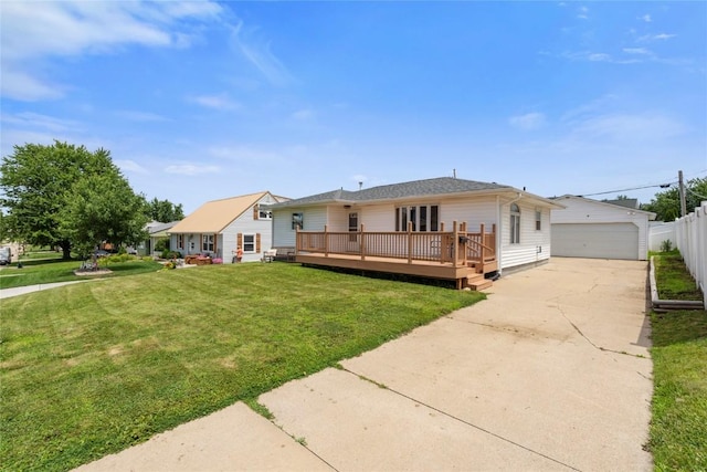 2469 1st St SW, Cedar Rapids, IA 52404 - view of front of house featuring a wooden deck, a garage, and an outbuilding