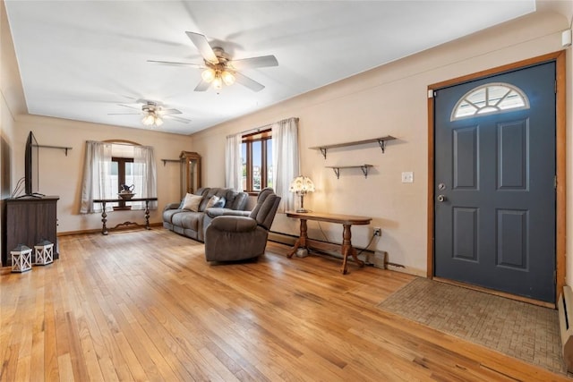 2469 1st St SW, Cedar Rapids, IA 52404 - entryway with light wood finished floors and ceiling fan