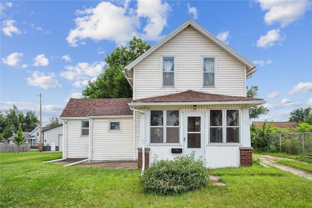 409 Railroad St, Fairfax, IA 52228 - rear view of house featuring a shingled roof
