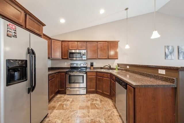 5616 Dostal Dr SW, Cedar Rapids, IA 52404 - kitchen with appliances with stainless steel finishes, a peninsula, brown cabinetry, pendant lighting, and high vaulted ceiling