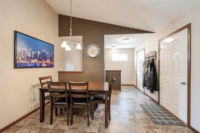 5616 Dostal Dr SW, Cedar Rapids, IA 52404 - dining room featuring lofted ceiling and a chandelier