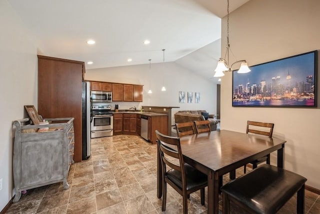 5616 Dostal Dr SW, Cedar Rapids, IA 52404 - dining space featuring lofted ceiling and recessed lighting